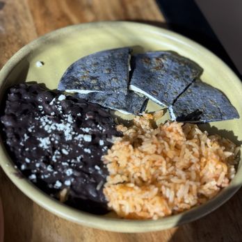 Oaxaca signature dishes Mole NegroTlayudasChapulines (grasshoppers)Mezcal